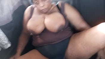 MILF seducing in the rear seat of a car