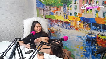 Flavia Oliver pleasures Natasha Steffens with her tongue during podcast recording