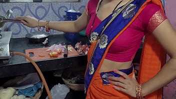 Desi aunty gets seduced by a hot blonde in the kitchen