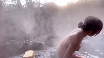 A Japanese hot spring girl with a big ass and a deep valley massages outdoors